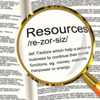 Resources Definition Magnifier Showing Materials Assets And Manpower For A Business